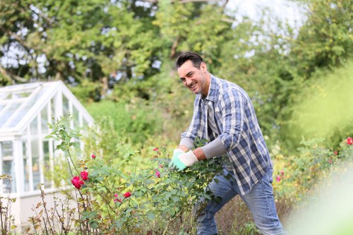 Enfield Highway gardeners maintaining a healthy lawn